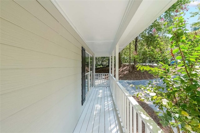 balcony featuring a porch