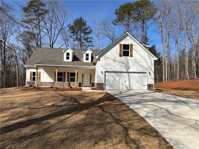 back of property with a garage