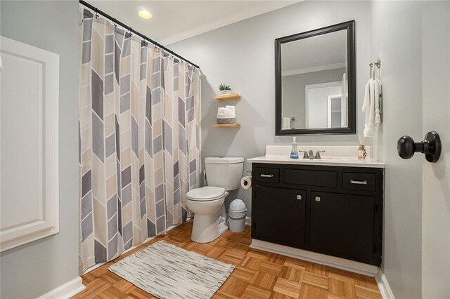 bathroom featuring vanity, toilet, parquet floors, and crown molding