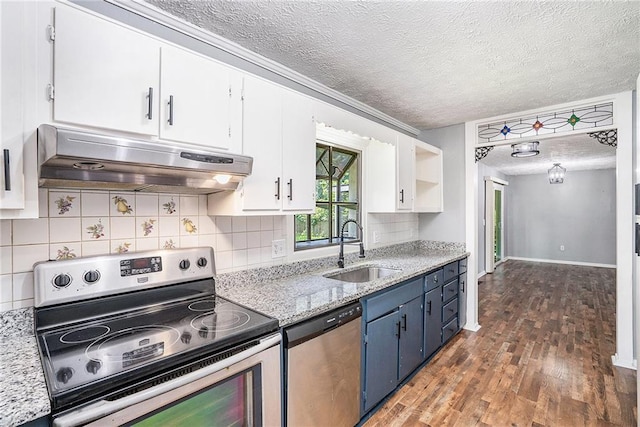 96 S Forty Pass S, Hiram, GA 30141 - kitchen with stainless steel appliances, under cabinet range hood, a textured ceiling, blue cabinetry, and white cabinetry