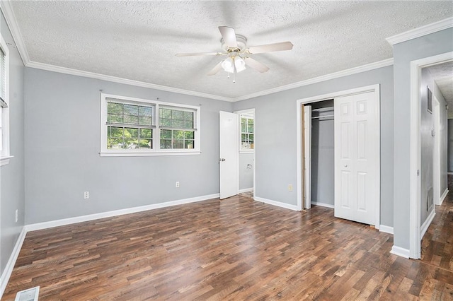 96 S Forty Pass S, Hiram, GA 30141 - unfurnished bedroom with wood finished floors, a textured ceiling, a closet, ceiling fan, and ornamental molding