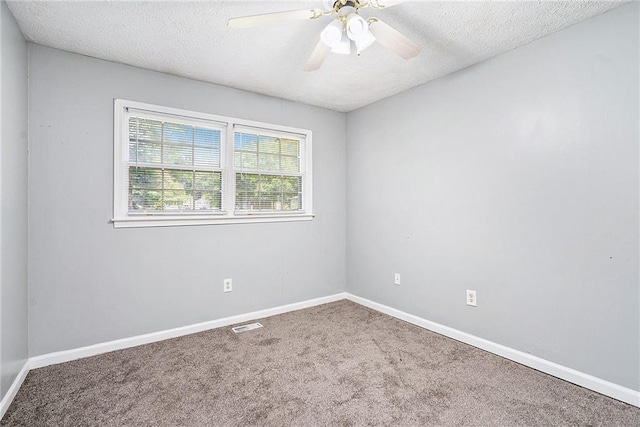 96 S Forty Pass S, Hiram, GA 30141 - spare room featuring carpet, a textured ceiling, and ceiling fan