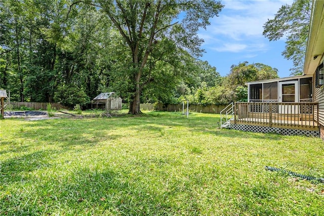 96 S Forty Pass S, Hiram, GA 30141 - fenced backyard featuring a sunroom and a storage unit