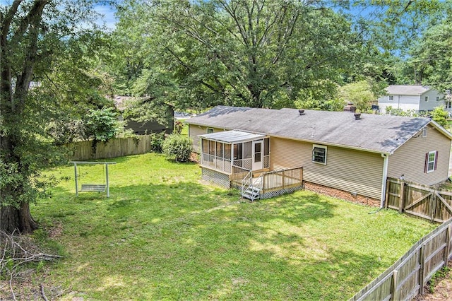96 S Forty Pass S, Hiram, GA 30141 - fenced backyard featuring a sunroom and a wooden deck