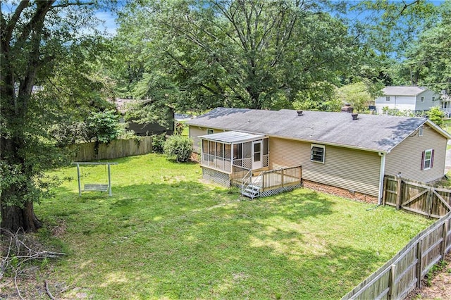 96 S Forty Pass S, Hiram, GA 30141 - fenced backyard featuring a sunroom and a wooden deck