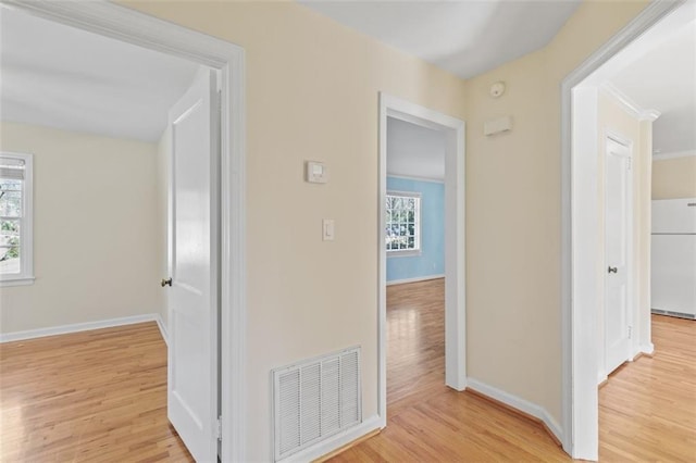 hallway featuring light hardwood / wood-style flooring