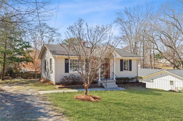 view of front of home with a front lawn