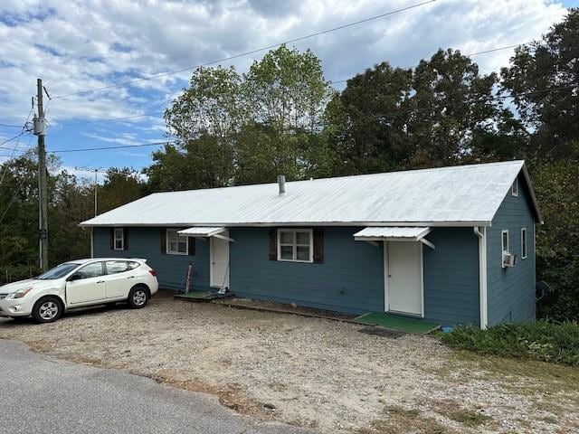 single story home with cooling unit