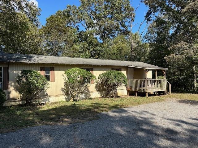 view of front of property featuring a deck