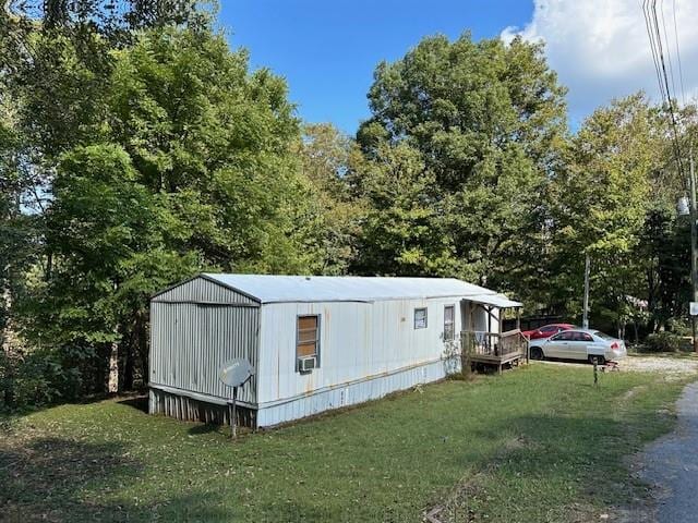 view of outdoor structure featuring a yard