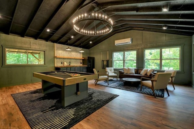 game room featuring a notable chandelier, a wall mounted AC, wood finished floors, pool table, and vaulted ceiling with beams