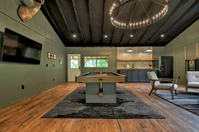 playroom featuring billiards, wood finished floors, baseboards, and high vaulted ceiling