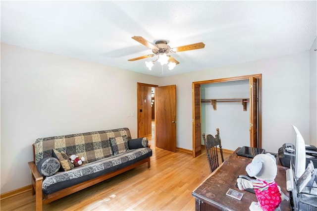 5670 Lanny Dr, Powder Springs, GA 30127 - home office with a ceiling fan and light wood-style floors