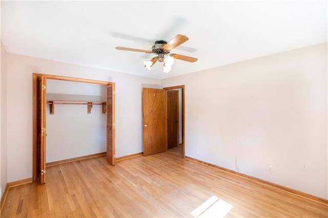 5670 Lanny Dr, Powder Springs, GA 30127 - unfurnished bedroom featuring light wood-style floors, a closet, and ceiling fan