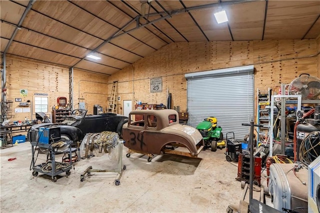 5670 Lanny Dr, Powder Springs, GA 30127 - garage with a workshop area