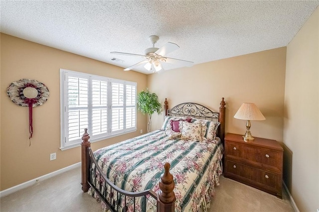 626 Dahoma Trl, Woodstock, GA 30188 - bedroom with carpet, baseboards, a textured ceiling, and a ceiling fan