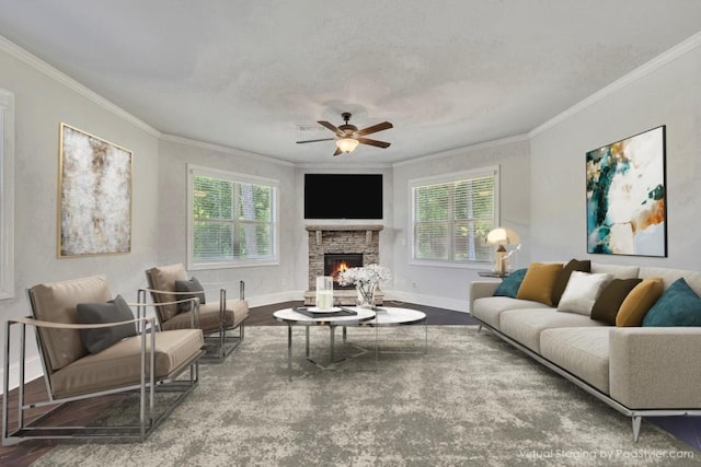 1231 Fawndale Dr NW, Kennesaw, GA 30152 - living area with ornamental molding, plenty of natural light, a stone fireplace, ceiling fan, and baseboards