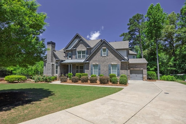 1231 Fawndale Dr NW, Kennesaw, GA 30152 - craftsman house featuring concrete driveway, a front yard, brick siding, and a chimney