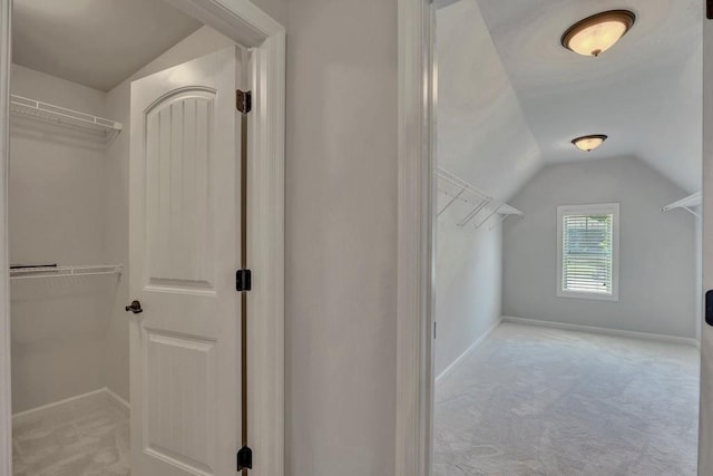 1231 Fawndale Dr NW, Kennesaw, GA 30152 - spacious closet featuring light carpet and lofted ceiling