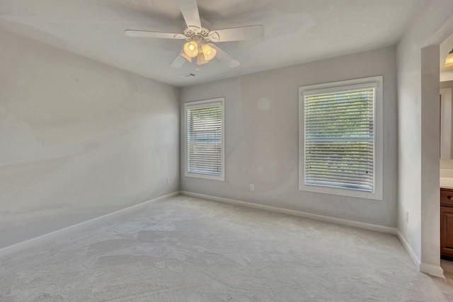 1231 Fawndale Dr NW, Kennesaw, GA 30152 - unfurnished room with light carpet, baseboards, and ceiling fan