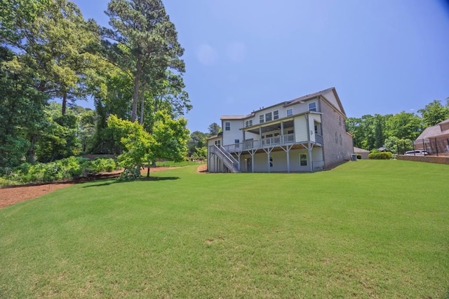 1231 Fawndale Dr NW, Kennesaw, GA 30152 - rear view of property featuring a lawn