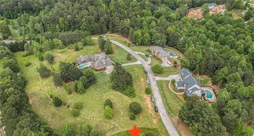 112 Summit Ln, Bremen, GA 30110 - aerial view of property and surrounding area featuring a heavily wooded area