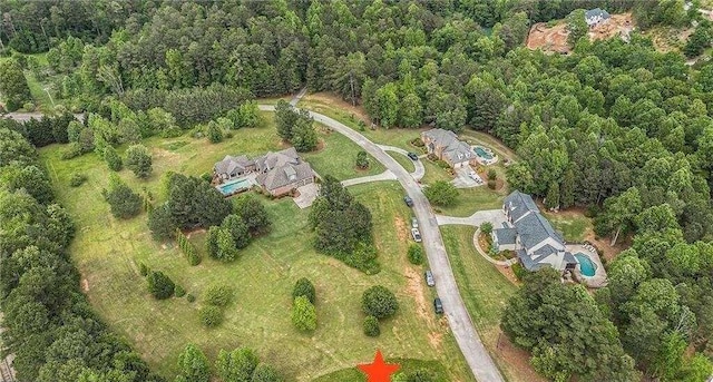 112 Summit Ln, Bremen, GA 30110 - aerial view of property and surrounding area featuring a heavily wooded area