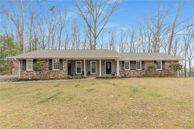 single story home featuring a front yard and covered porch