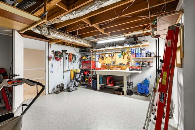 basement featuring a workshop area