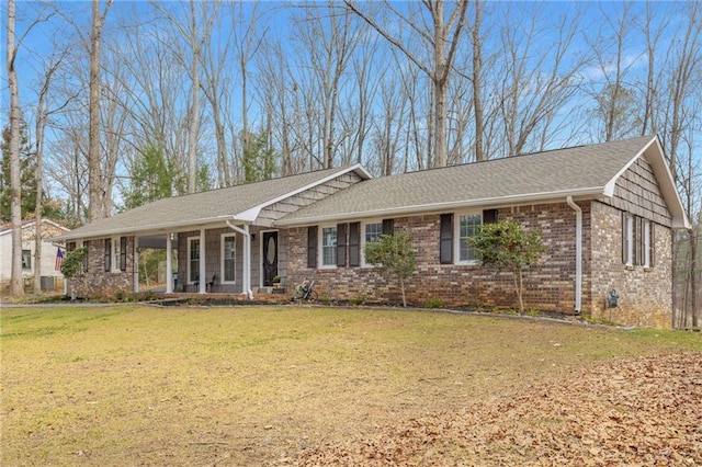 ranch-style house with a front lawn and a porch