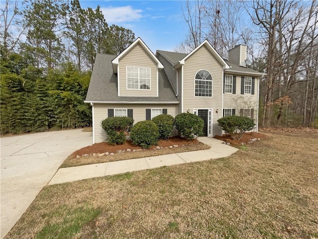 view of front of home with a front yard