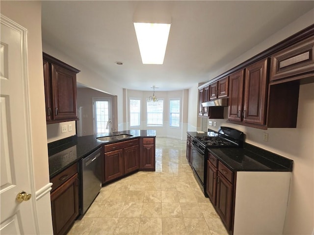 kitchen featuring sink, black gas stove, decorative light fixtures, stainless steel dishwasher, and kitchen peninsula