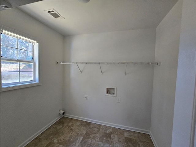 clothes washing area with electric dryer hookup and hookup for a washing machine