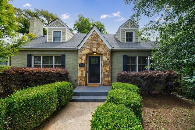 2668 Jefferson Ter, East Point, GA 30344 - view of front of property with stone siding and roof with shingles