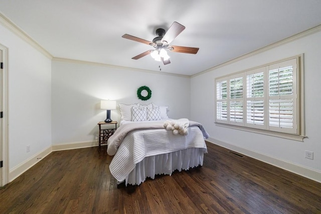 2668 Jefferson Ter, East Point, GA 30344 - bedroom with crown molding, wood finished floors, baseboards, and ceiling fan