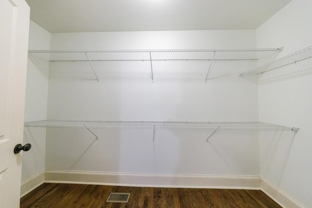 2668 Jefferson Ter, East Point, GA 30344 - walk in closet with dark wood-style floors
