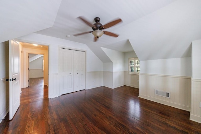 2668 Jefferson Ter, East Point, GA 30344 - additional living space featuring ceiling fan, wood finished floors, lofted ceiling, and a wainscoted wall