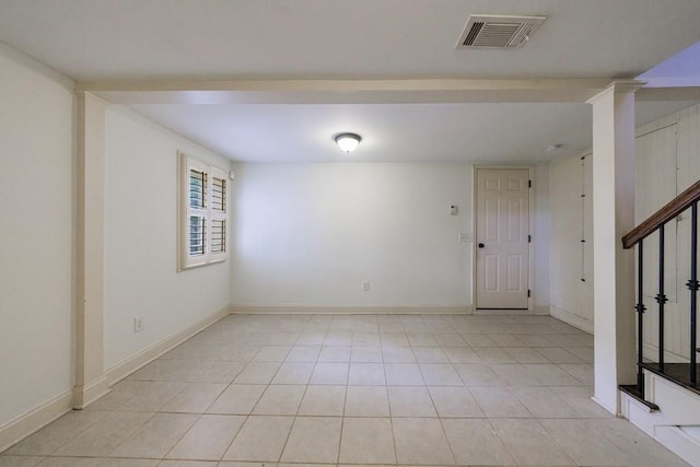2668 Jefferson Ter, East Point, GA 30344 - spare room featuring light tile patterned floors, stairs, and baseboards