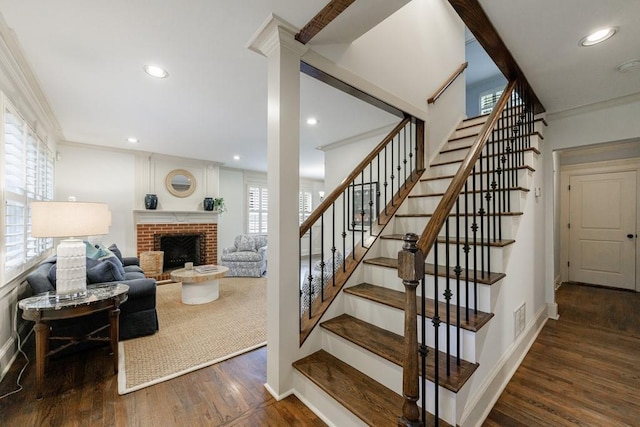 2668 Jefferson Ter, East Point, GA 30344 - stairs with wood finished floors, a brick fireplace, baseboards, recessed lighting, and ornamental molding