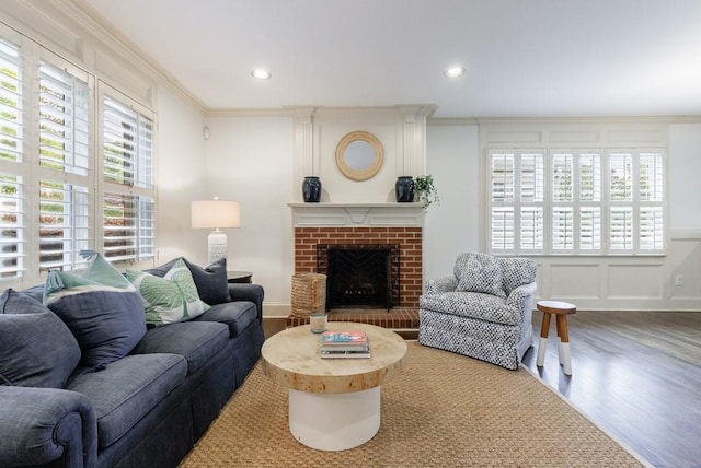 2668 Jefferson Ter, East Point, GA 30344 - living area with a decorative wall, wood finished floors, ornamental molding, a fireplace, and recessed lighting