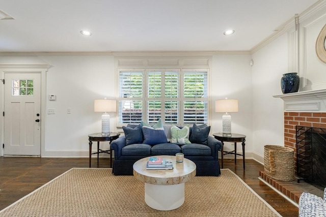 2668 Jefferson Ter, East Point, GA 30344 - living area featuring baseboards, wood finished floors, crown molding, a brick fireplace, and recessed lighting