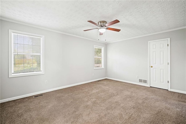 94 Park Ave W, Dallas, GA 30157 - spare room with ceiling fan, carpet flooring, ornamental molding, and a textured ceiling
