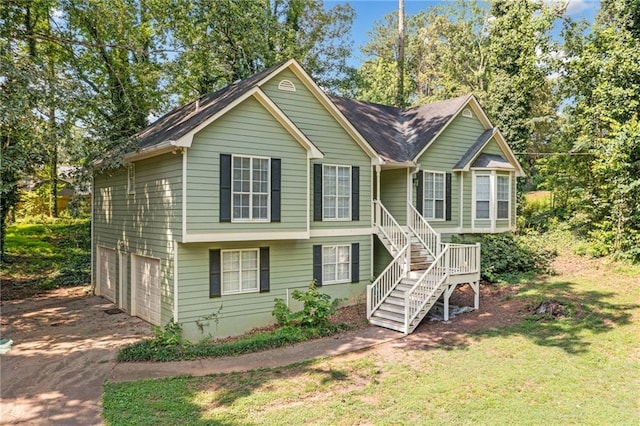 94 Park Ave W, Dallas, GA 30157 - view of front of home with stairway, driveway, a front yard, and a garage