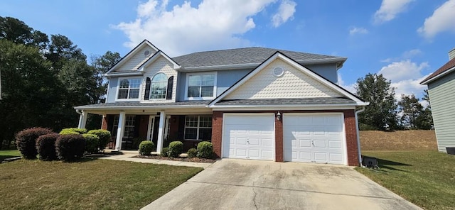 view of front of home featuring a front yard and a porch