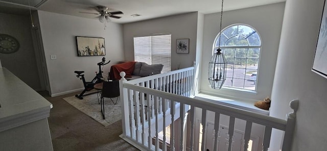 hallway featuring carpet