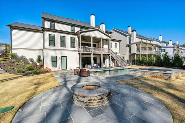 109 Owens Mill Pl, Canton, GA 30115 - back of property featuring a ceiling fan, stairs, fence, an in ground hot tub, and a patio