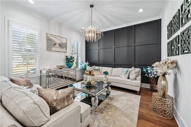 109 Owens Mill Pl, Canton, GA 30115 - dining area featuring a decorative wall, crown molding, wood finished floors, and a chandelier