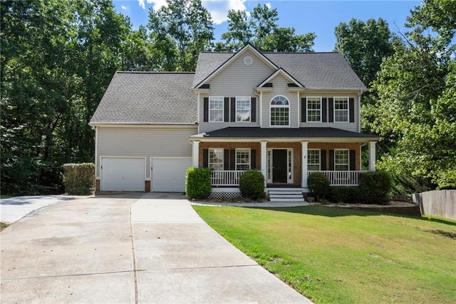 colonial home featuring a front lawn and a porch