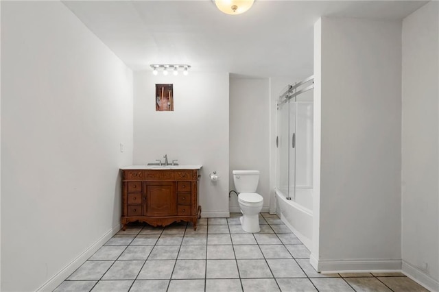 full bathroom featuring vanity, tile patterned flooring, toilet, and washtub / shower combination