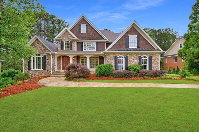 7 Hogan Ln NW, Rome, GA 30165 - craftsman house with stone siding, a front lawn, and covered porch